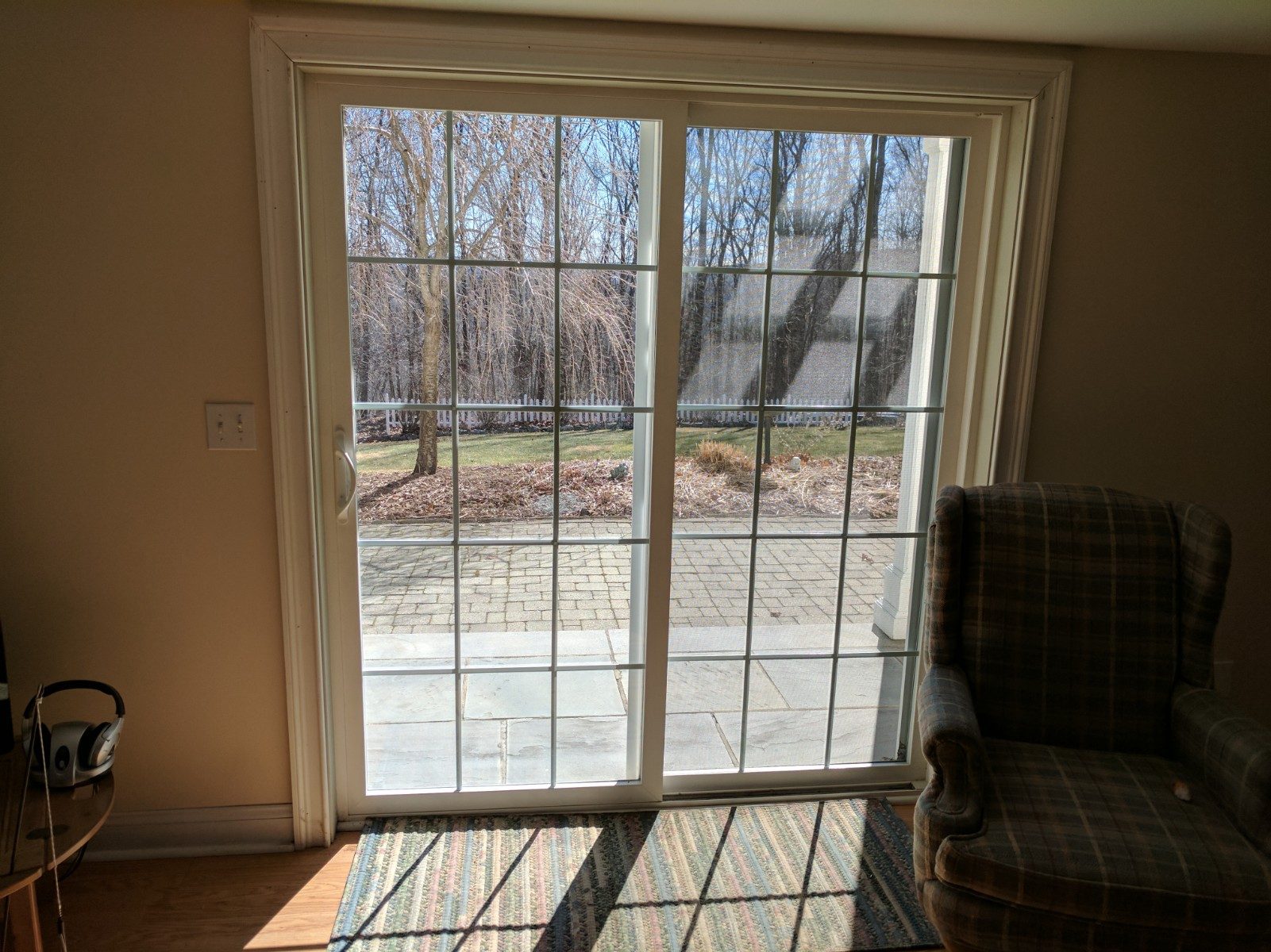 Sliding glass door leading to steps and patio